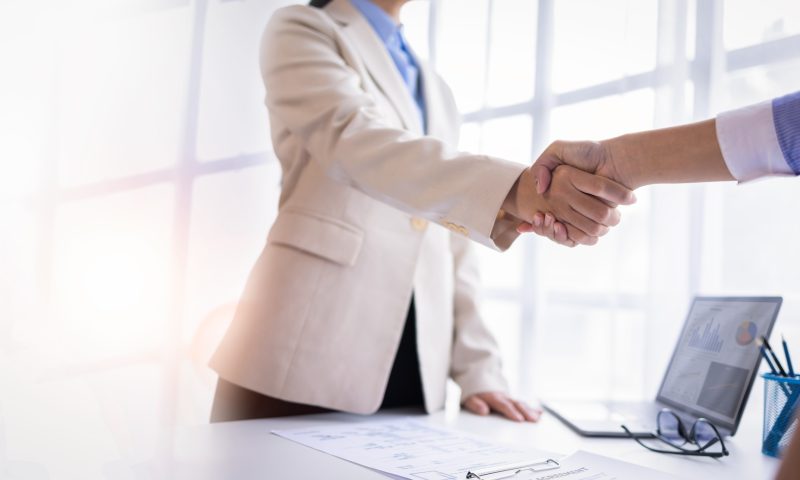 Business handshake for teamwork of business merger and acquisition,successful negotiate,hand shake, 成長戦略や事業承継を支える、信頼のM&A仲介・FA支援